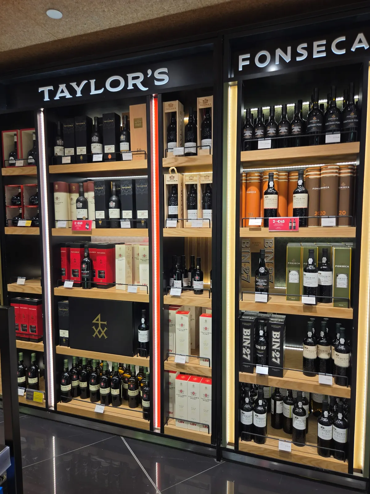 Taylor's and Fonseca brand cabinets with 30, 40 and 50 year old tawny, vintage port and Bin 27