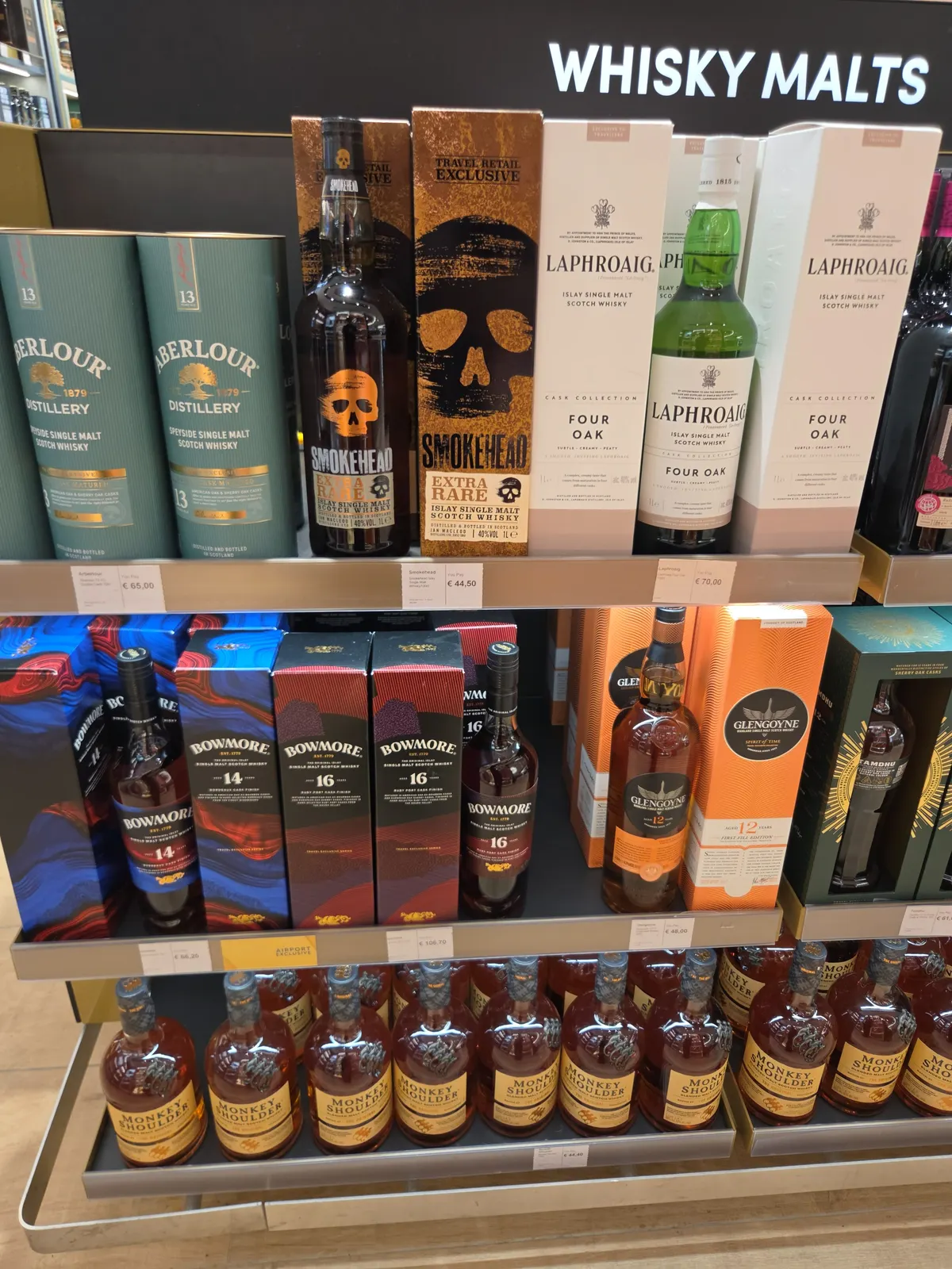 The whisky malts shelf with Aberlour 13, Smokehead Extra Rare, Laphroaig Four Oak, Bowmore 14 and 16, Glengoyne 12 and Monkey Shoulder